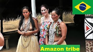 Amazon tribe in the rainforest [upl. by Saddler]